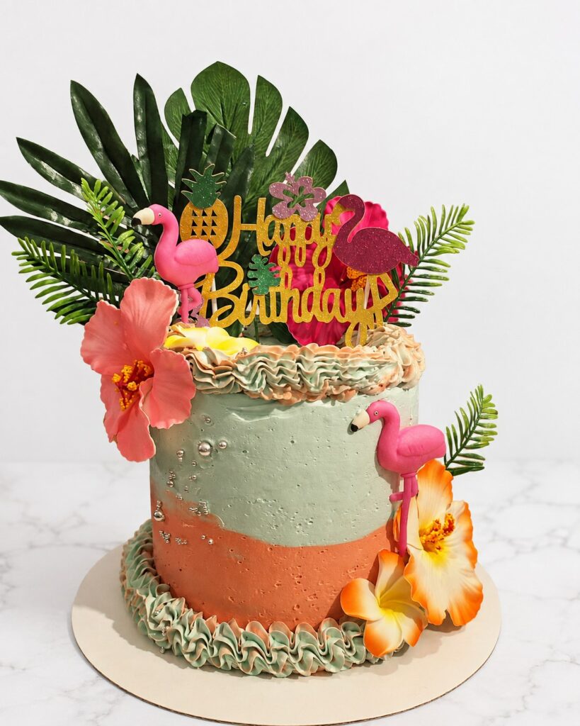 Cake design tropical avec flamants roses et fleurs exotiques